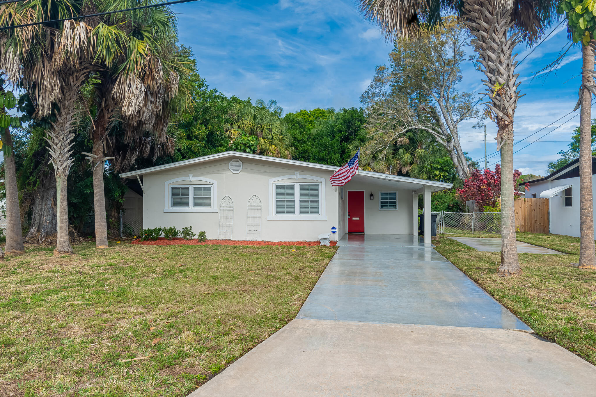 602 Azalea Avenue Fort Pierce, FL 34982 - Photo 16 of 20 a front view of house with yard and green space