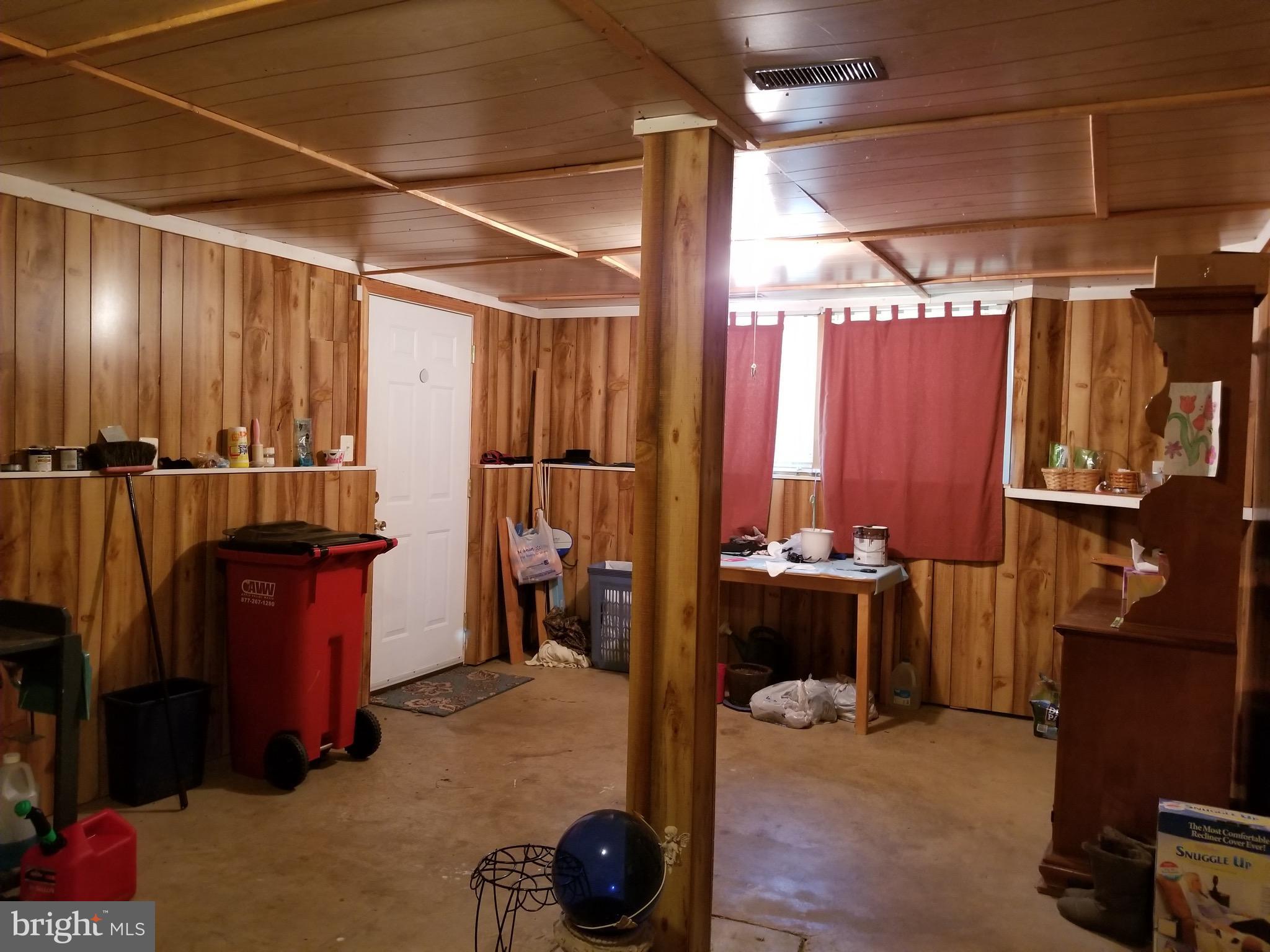 207 East Fourteenth Avenue Ranson, WV 25438 - Photo 21 of 24 a view of walk in closet with clothes and shoes