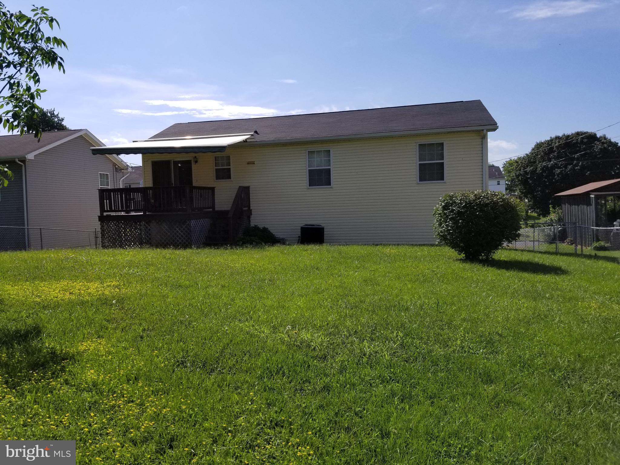 207 East Fourteenth Avenue Ranson, WV 25438 - Photo 4 of 24 a view of a house with a yard and sitting area