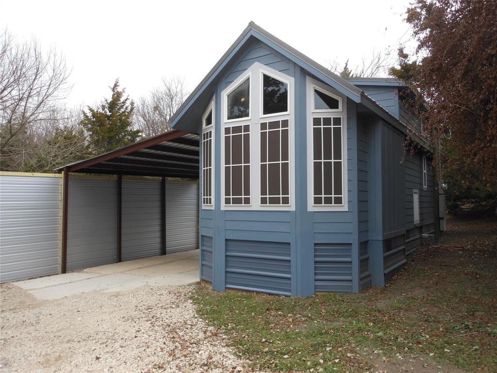 2350 East Stone Road Wylie, TX 75098 - Photo 20 of 24 a front view of a house with a yard
