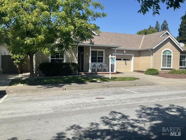 9131 Benny Goodman Way Windsor, CA 95492 - Photo 2 of 27 a front view of a house with a yard
