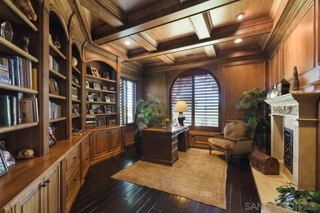 Encinitas, CA 92024 - Photo 16 of 25 a view of a living room with furniture and a book shelf