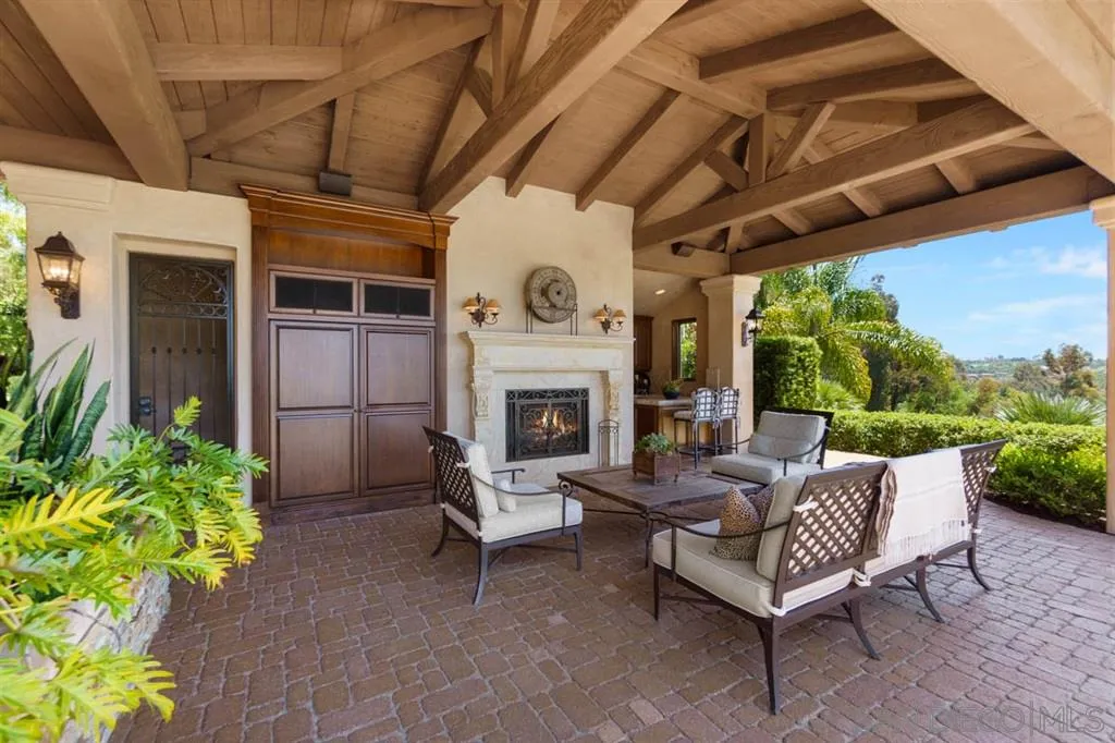 Encinitas, CA 92024 - Photo 20 of 25 a outdoor living space with furniture and a fireplace