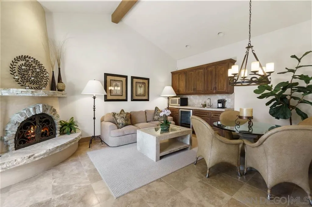 Encinitas, CA 92024 - Photo 21 of 25 a living room with furniture and a fireplace
