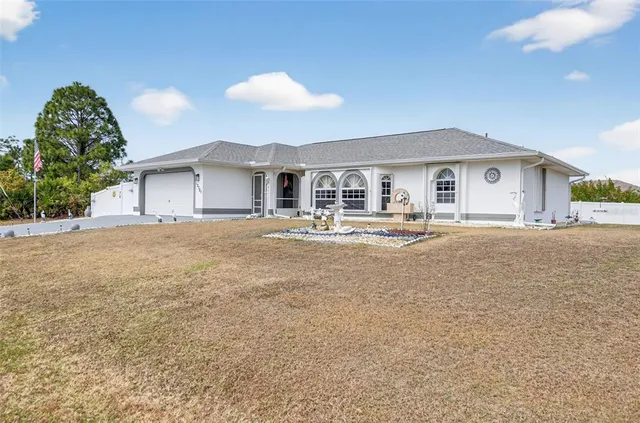 $309,000 | 12320 Evelyn Avenue, Port Charlotte, FL 33981