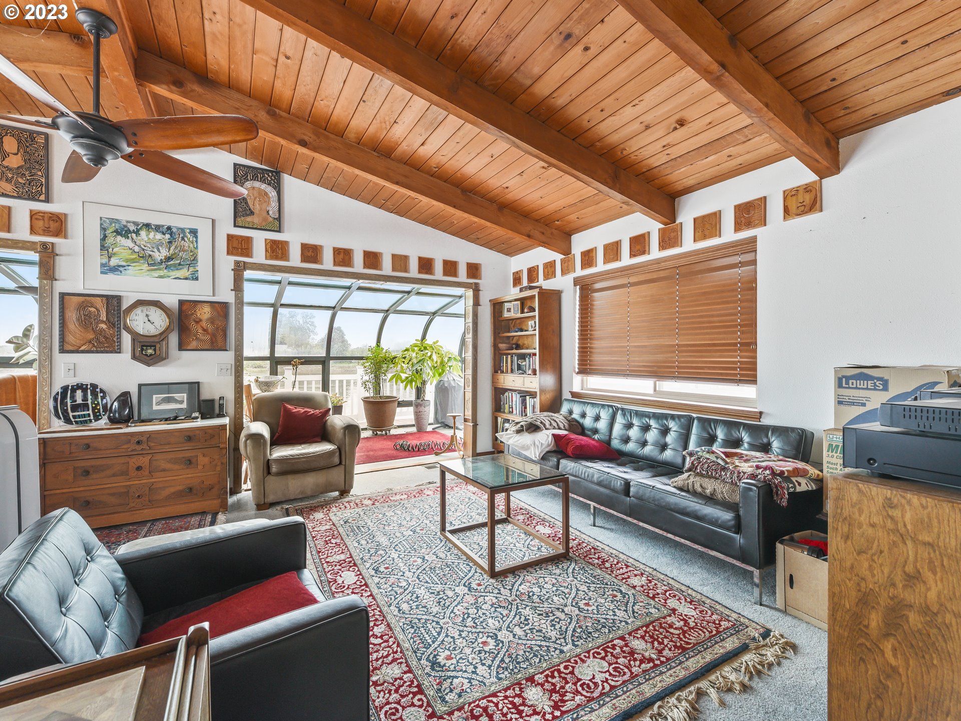 23586 Northwest St Helens Road, Unit M34 Portland, OR 97231 - Photo 3 of 20 a living room with furniture and a rug