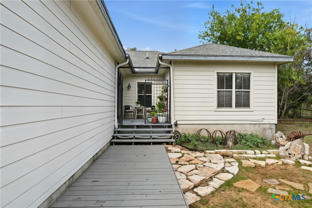 3075 Rustler Canyon Lake, TX 78133 - Photo 3 of 48 a view of a house with a patio