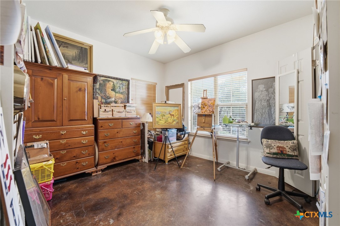 3075 Rustler Canyon Lake, TX 78133 - Photo 35 of 48 a bedroom with furniture and a window