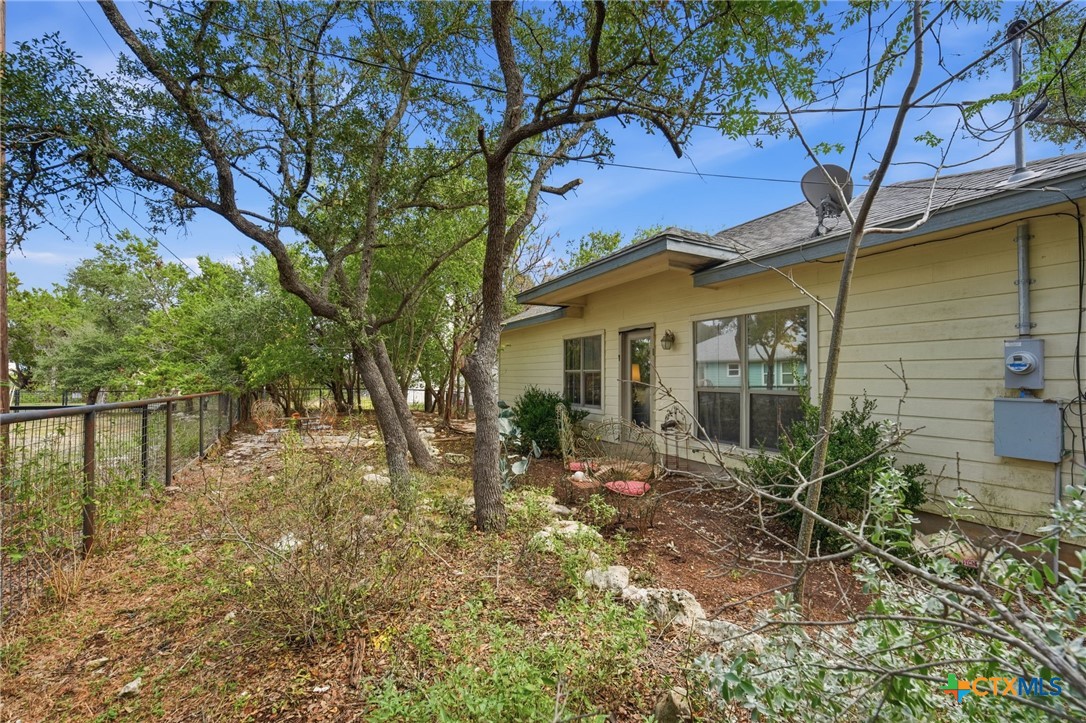 3075 Rustler Canyon Lake, TX 78133 - Photo 41 of 48 a view of a house with a yard
