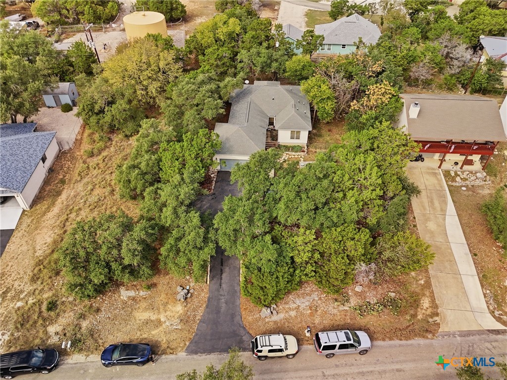 3075 Rustler Canyon Lake, TX 78133 - Photo 45 of 48 an aerial view of a house with yard