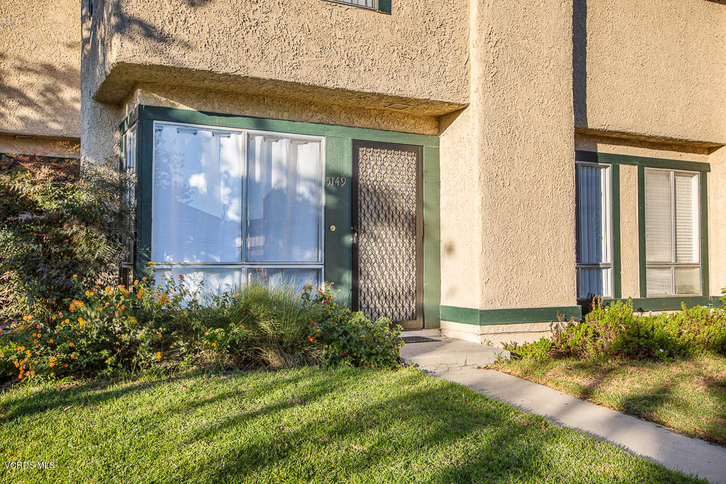 5149 Perkins Road Oxnard, CA 93033 - Photo 11 of 40 a front view of a house with garden