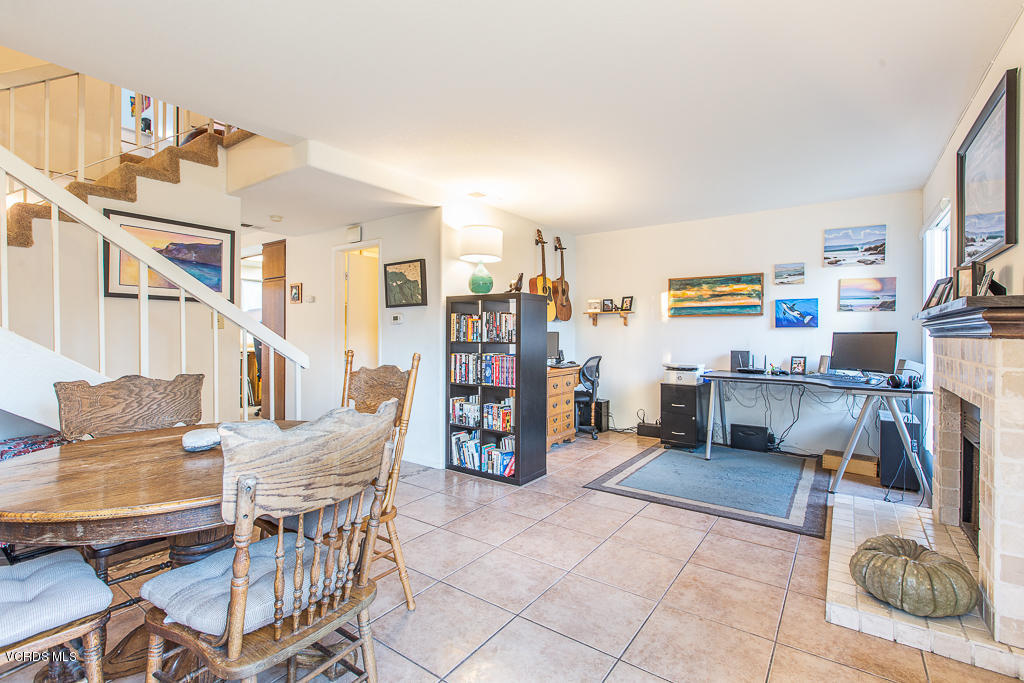 5149 Perkins Road Oxnard, CA 93033 - Photo 13 of 40 a living room with lots of furniture and a kitchen view