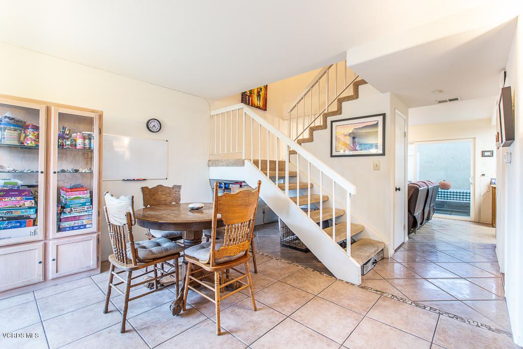 5149 Perkins Road Oxnard, CA 93033 - Photo 15 of 40 a view of a livingroom with furniture and staircase