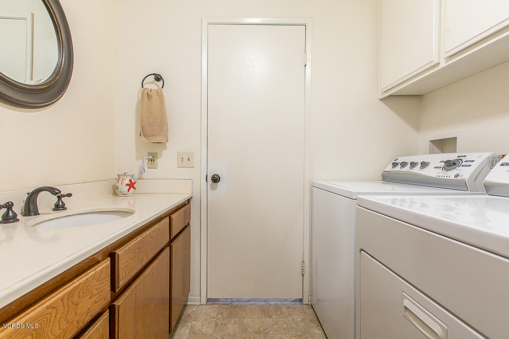 5149 Perkins Road Oxnard, CA 93033 - Photo 18 of 40 a bathroom with a sink and a mirror