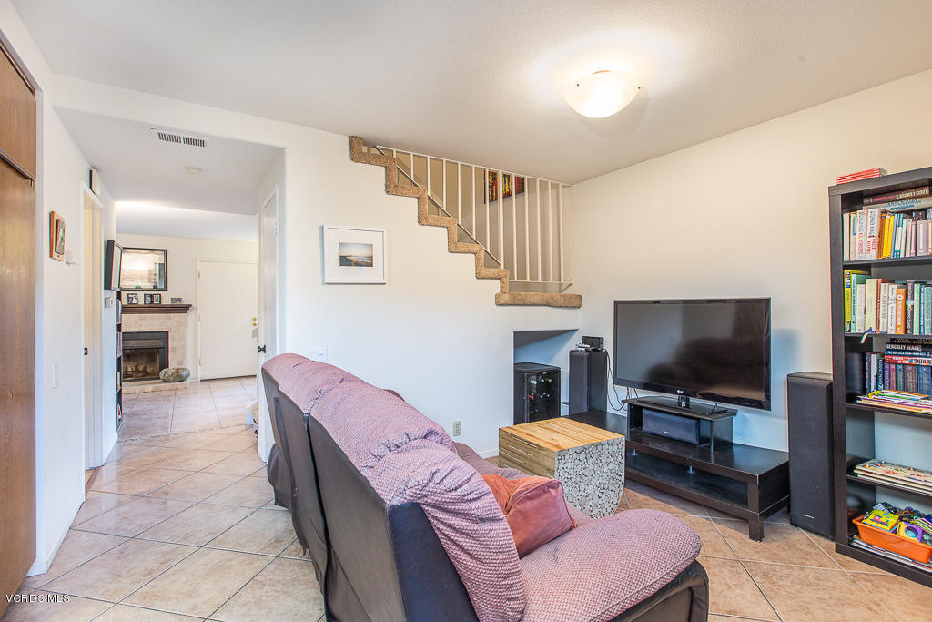 5149 Perkins Road Oxnard, CA 93033 - Photo 20 of 40 a living room with furniture and a flat screen tv