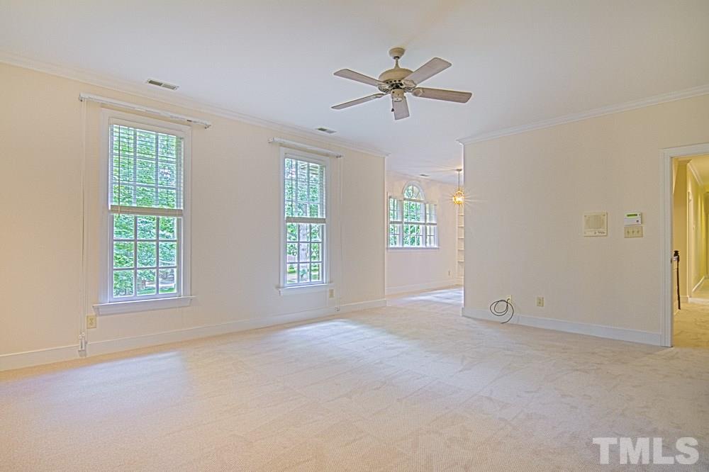 7612 Rainwater Road Raleigh, NC 27615 - Photo 18 of 22 a view of an empty room with a window
