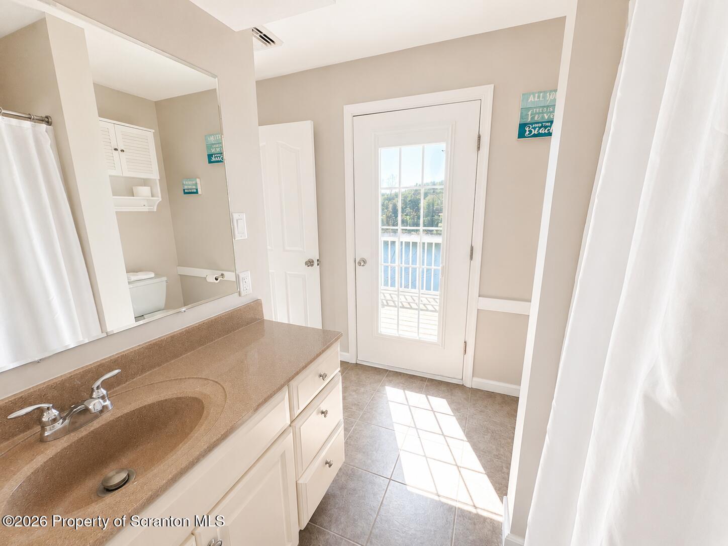 155 Baylor Road Nicholson, PA 18446 - Photo 40 of 53 a bathroom with a sink vanity granite tub and shower