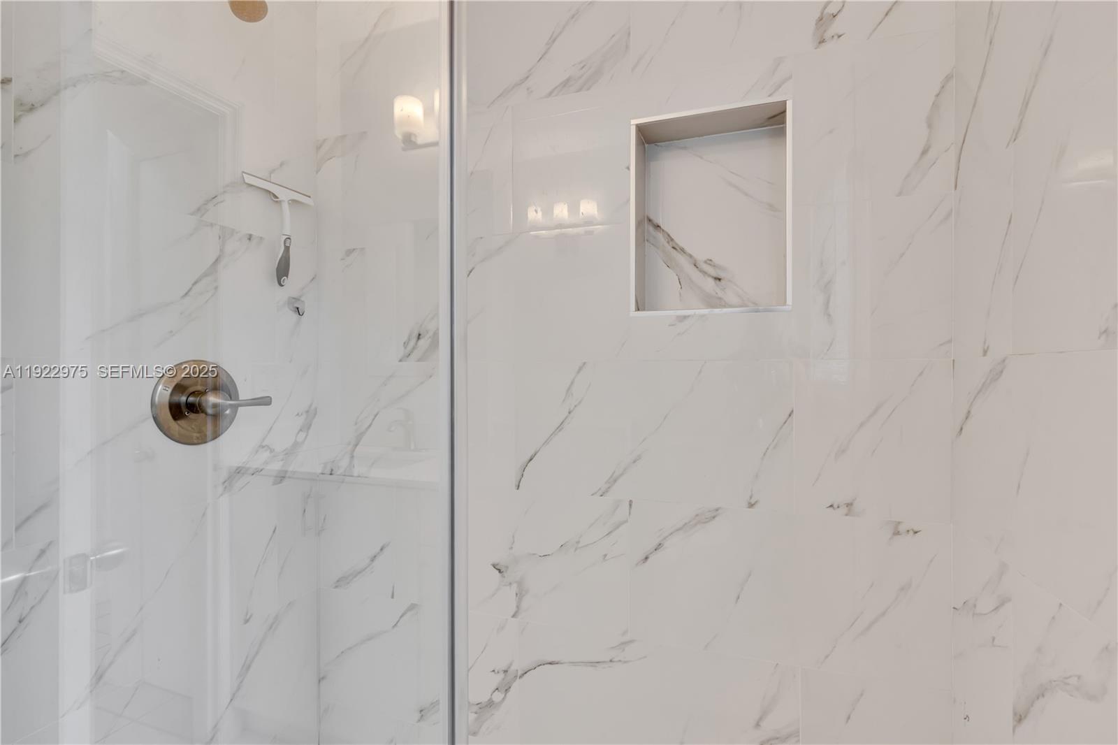 505 Southwest 11th Street, Unit 505 Miami, FL 33129 - Photo 19 of 31 a bathroom with a shower