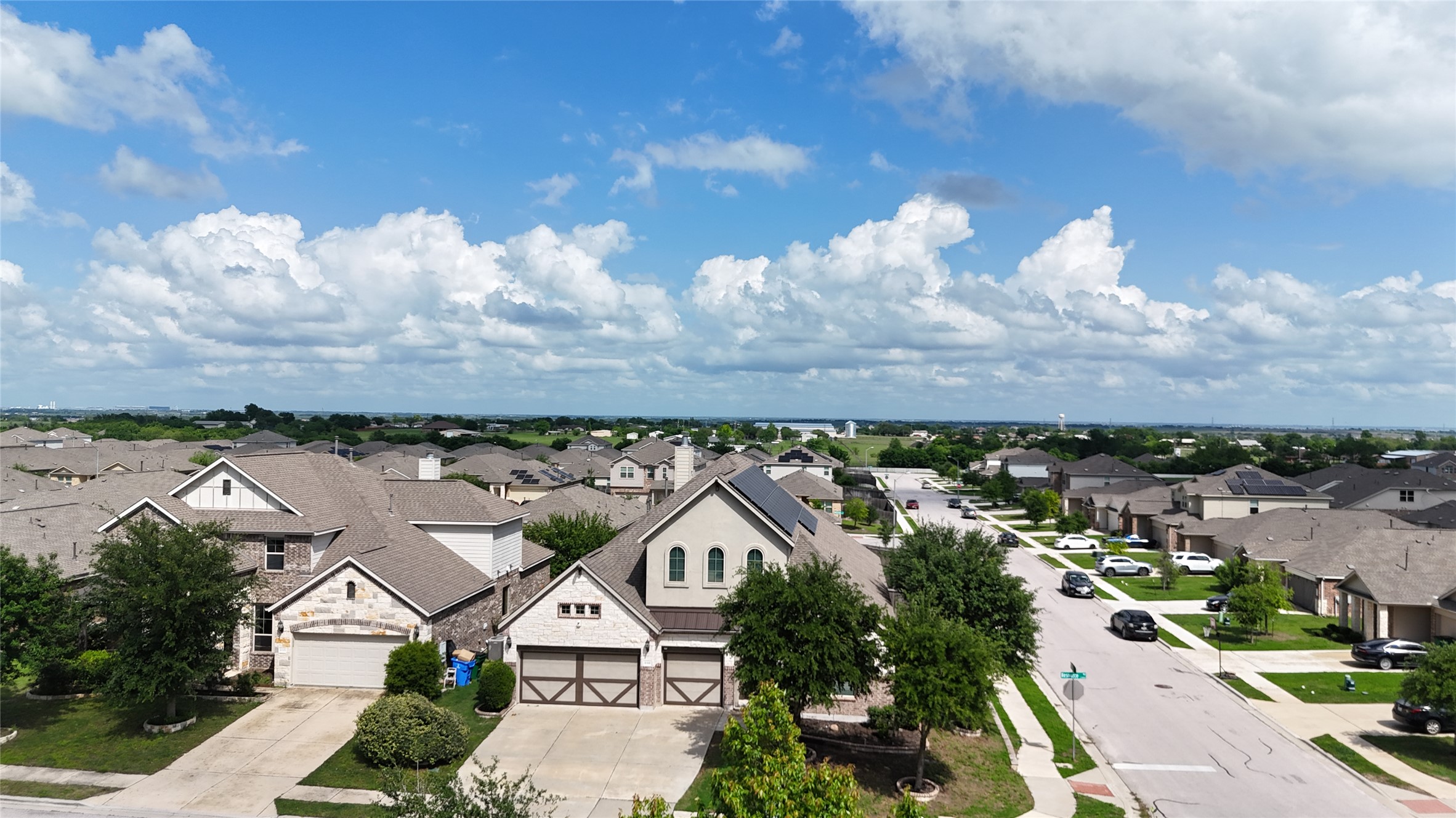 21301 Resource Road Pflugerville, TX 78660 - Photo 28 of 29 Residential neighborhood with a variety of architectural styles, including stone and siding exteriors