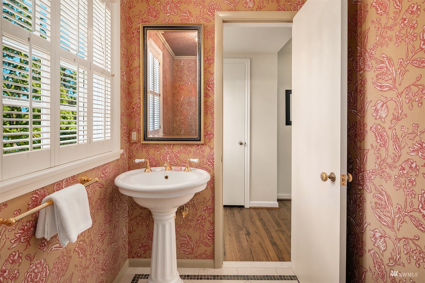 6560 Northeast Windermere Road Seattle, WA 98105 - Photo 13 of 35 a bathroom with a sink and a mirror