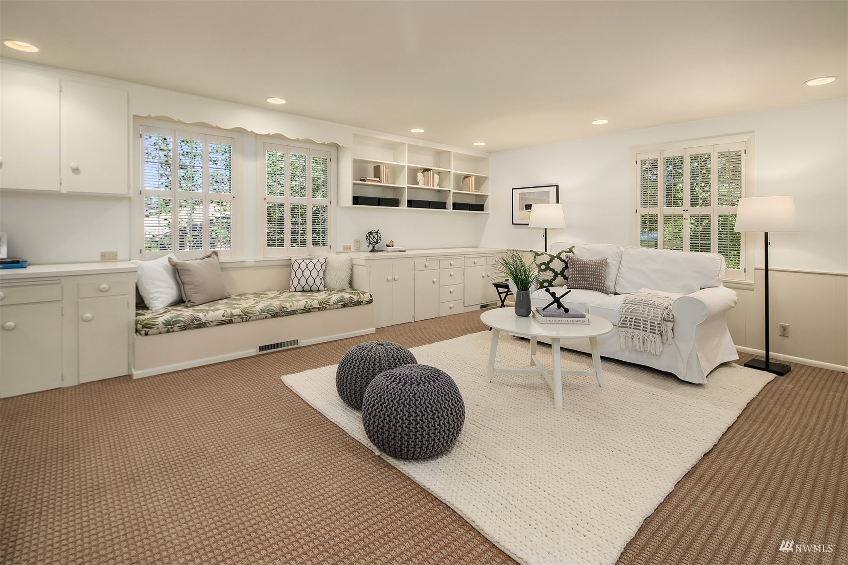 6560 Northeast Windermere Road Seattle, WA 98105 - Photo 15 of 35 a living room with furniture and a large window