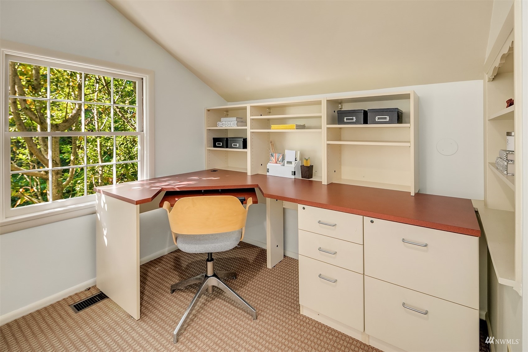 6560 Northeast Windermere Road Seattle, WA 98105 - Photo 17 of 35 a room with a chair and a window