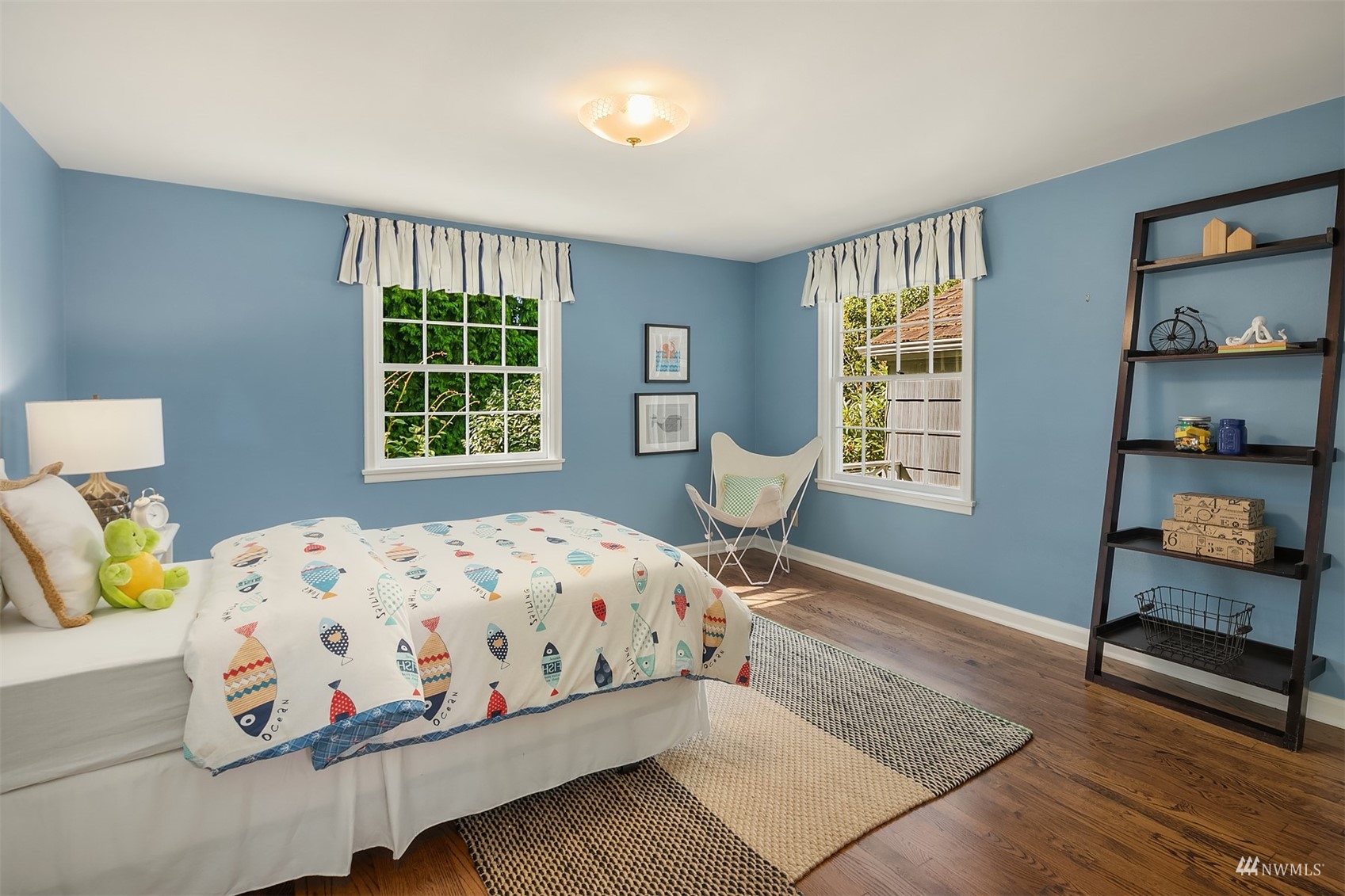 6560 Northeast Windermere Road Seattle, WA 98105 - Photo 19 of 35 a bedroom with a bed and window