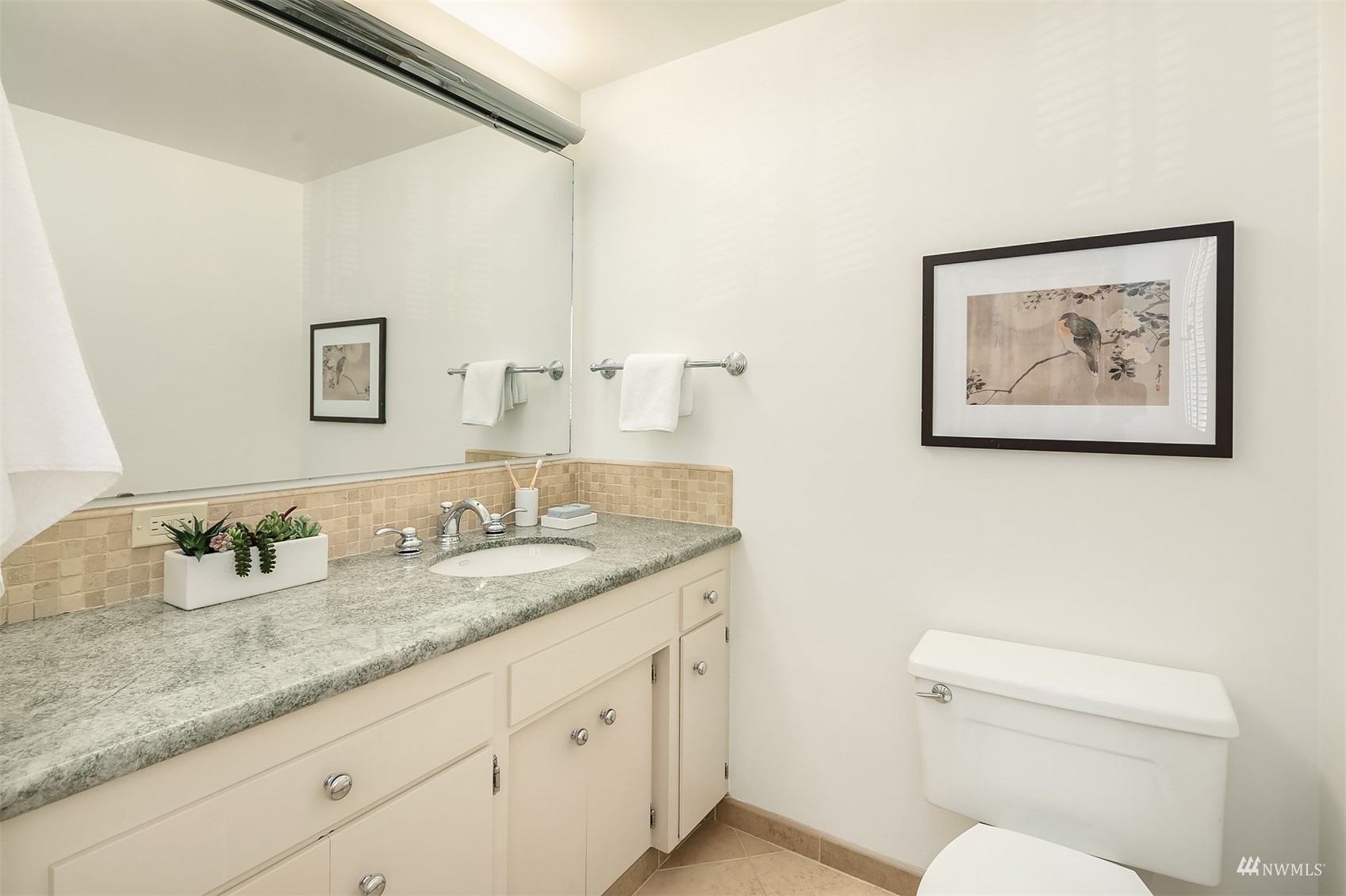 6560 Northeast Windermere Road Seattle, WA 98105 - Photo 21 of 35 a bathroom with a granite countertop sink mirror and toilet