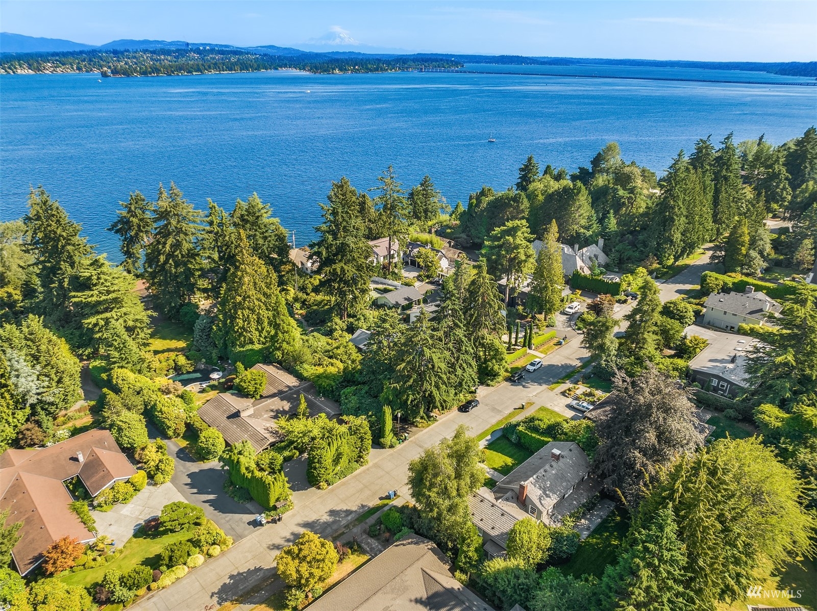 6560 Northeast Windermere Road Seattle, WA 98105 - Photo 30 of 35 a view of a lake with a building in the background
