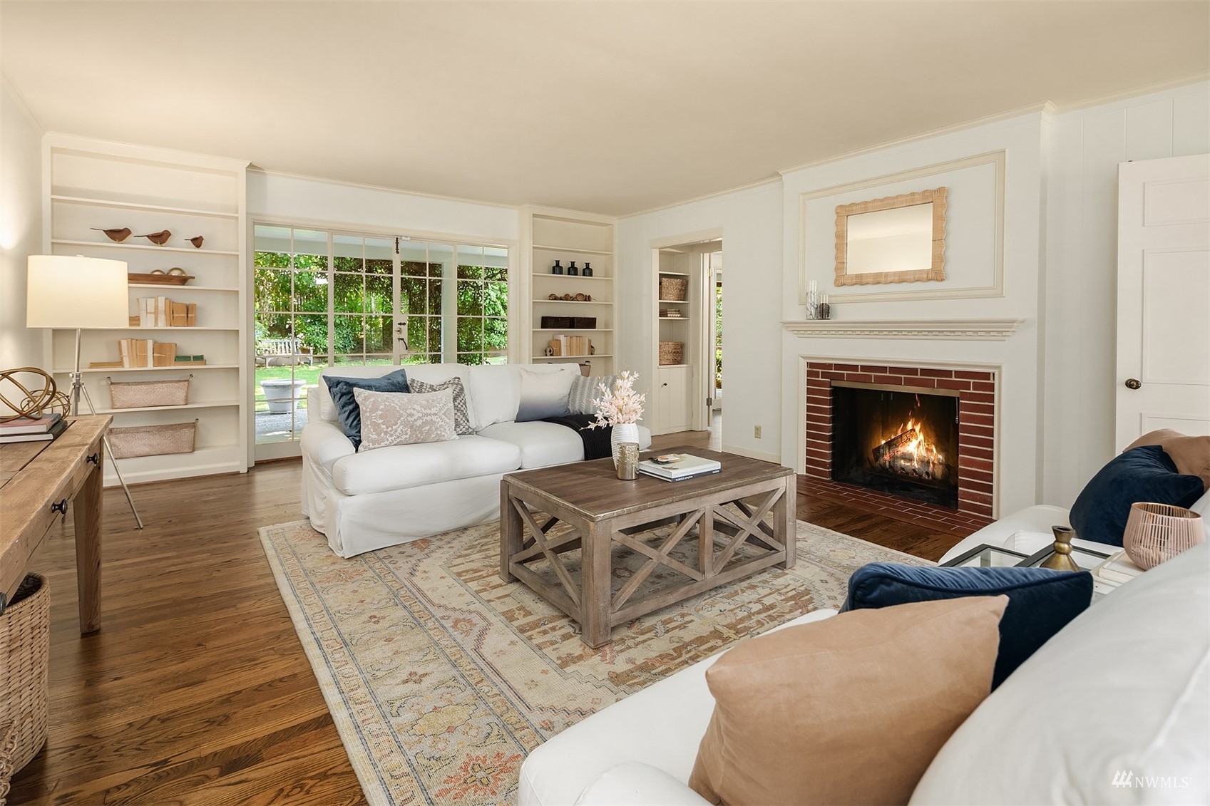 6560 Northeast Windermere Road Seattle, WA 98105 - Photo 3 of 35 a living room with furniture and a fireplace