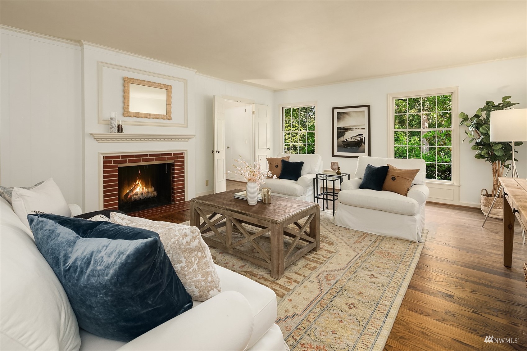 6560 Northeast Windermere Road Seattle, WA 98105 - Photo 4 of 35 a living room with furniture and a fireplace