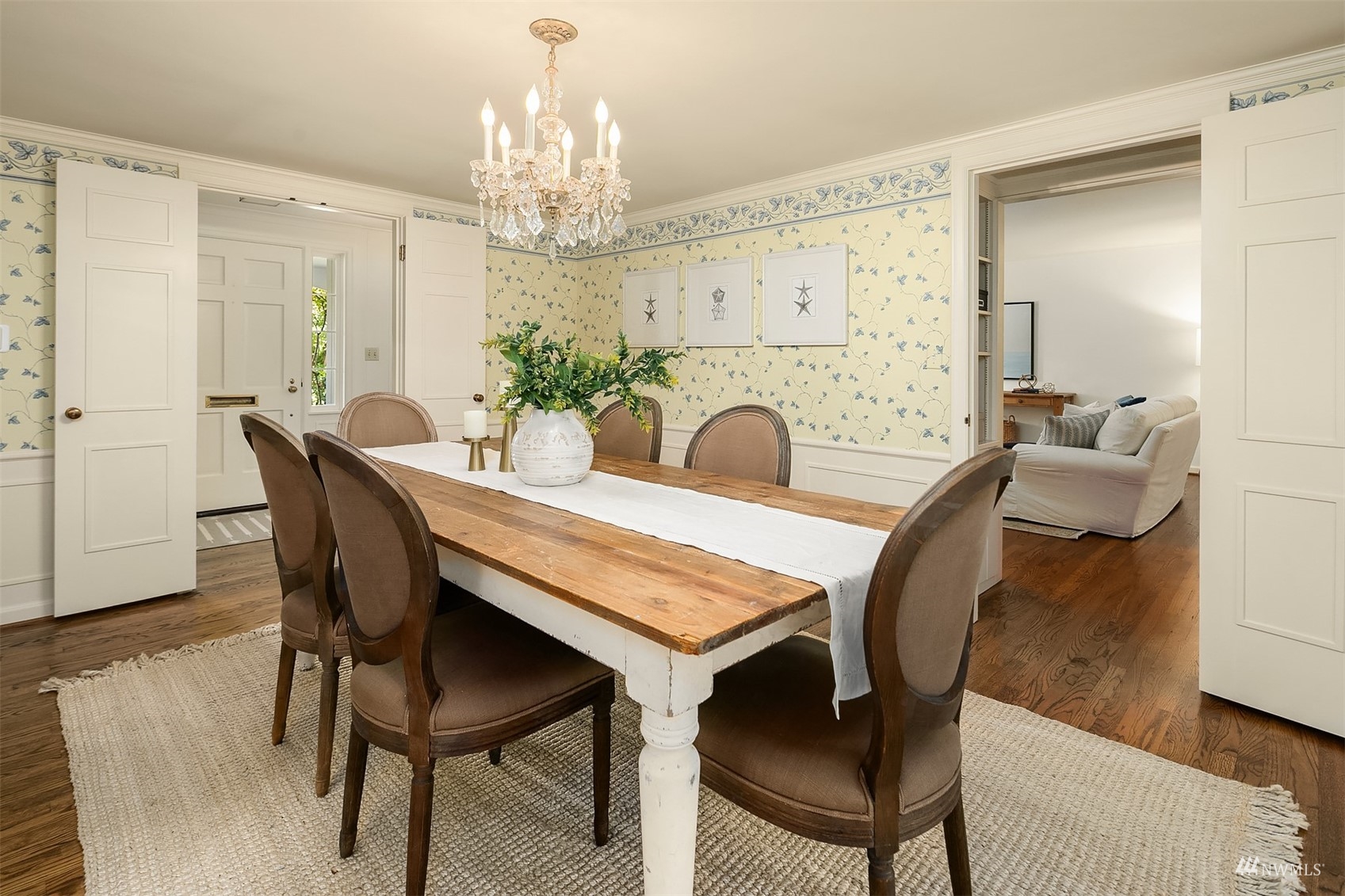 6560 Northeast Windermere Road Seattle, WA 98105 - Photo 6 of 35 a dining room with furniture a chandelier and wooden floor