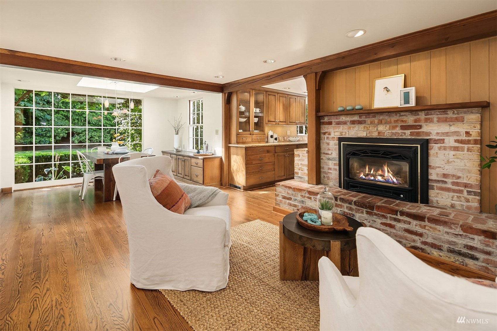 6560 Northeast Windermere Road Seattle, WA 98105 - Photo 7 of 35 a living room with furniture and a fireplace