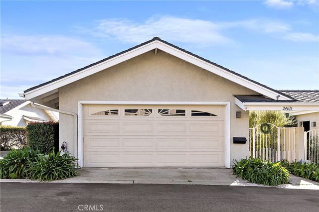 a view of a house with garage
