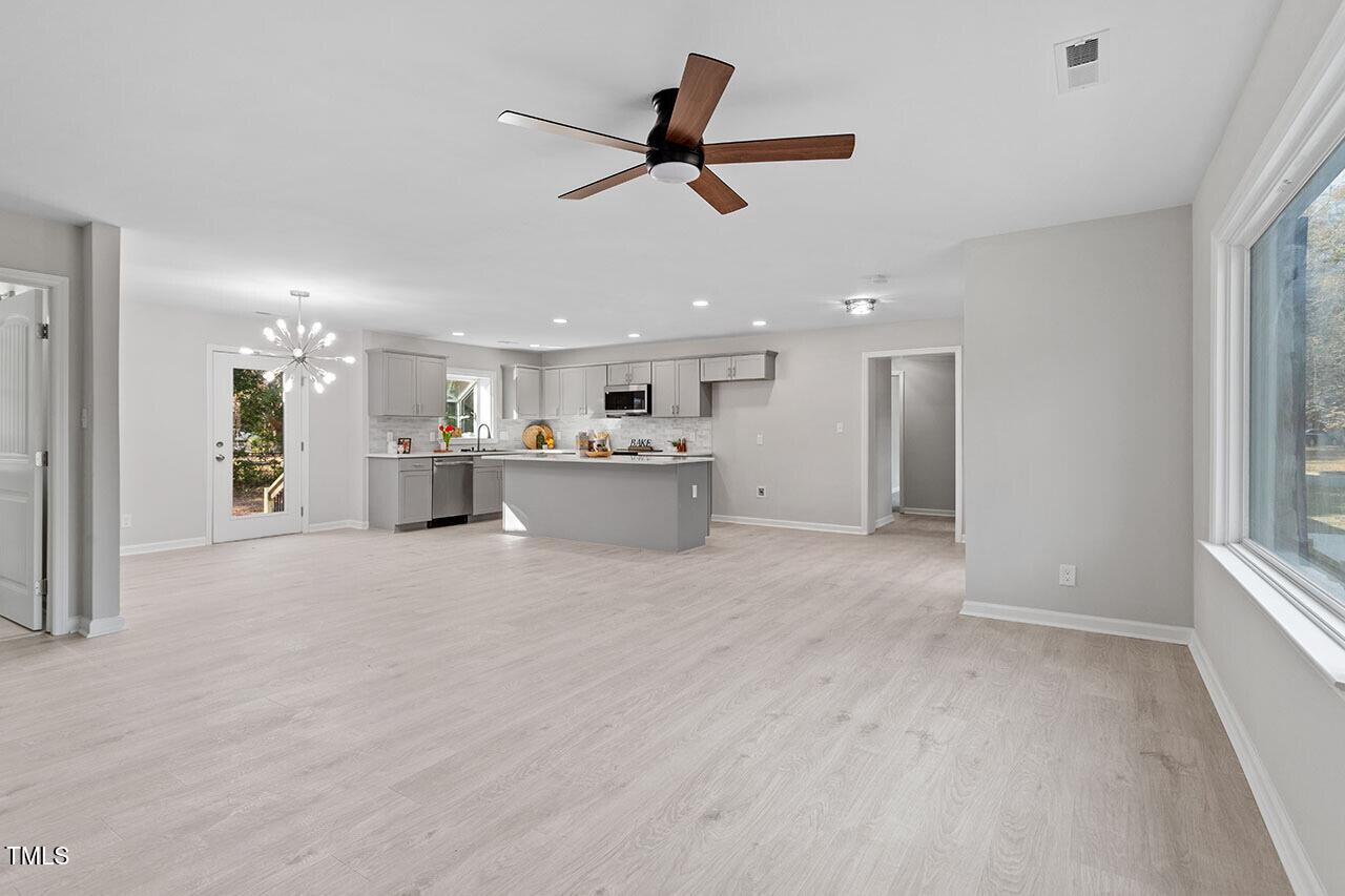 1014 Southerlund Road Garner, NC 27529 - Photo 15 of 36 a view of an empty room with a window