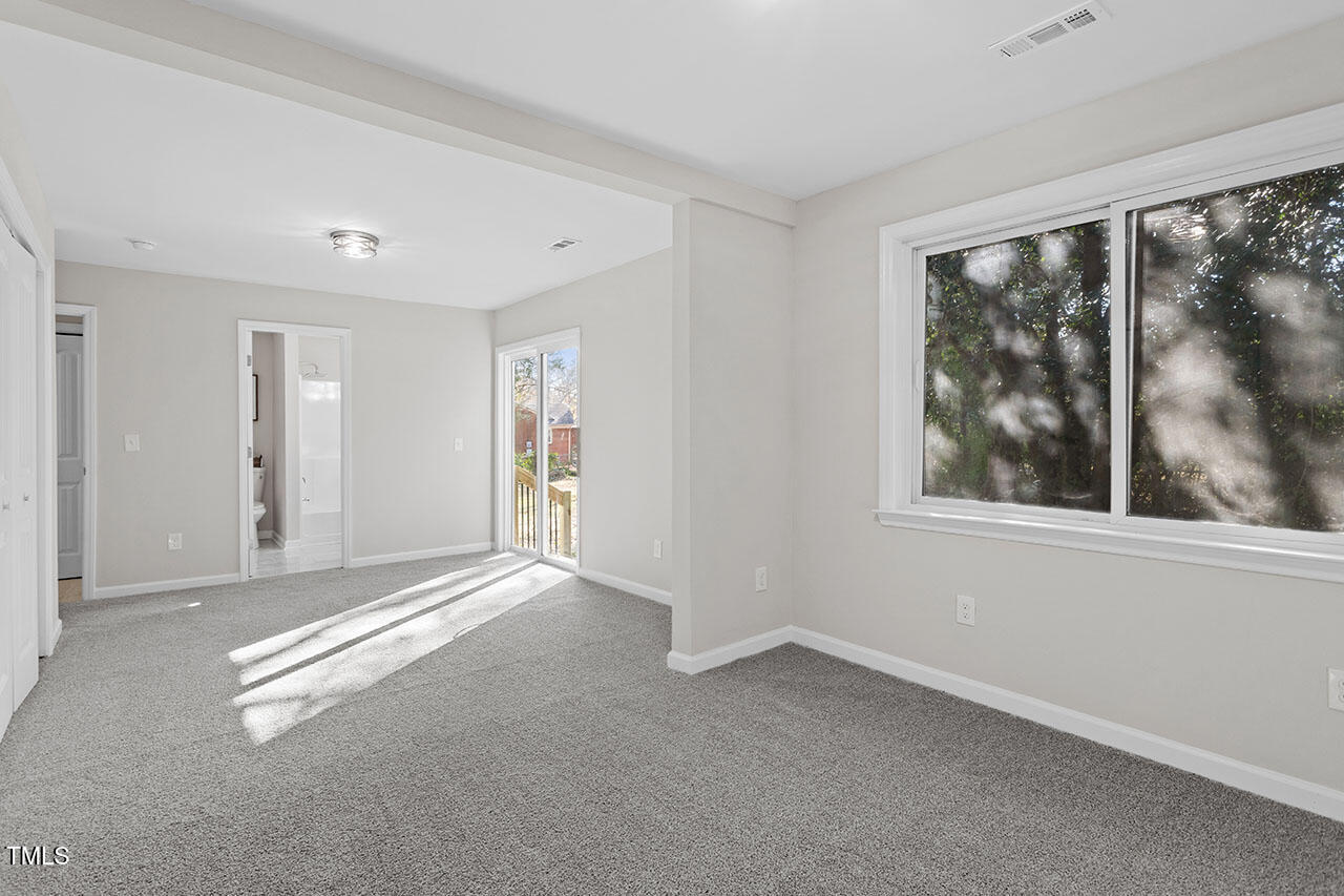 1014 Southerlund Road Garner, NC 27529 - Photo 20 of 36 a view of empty room with window