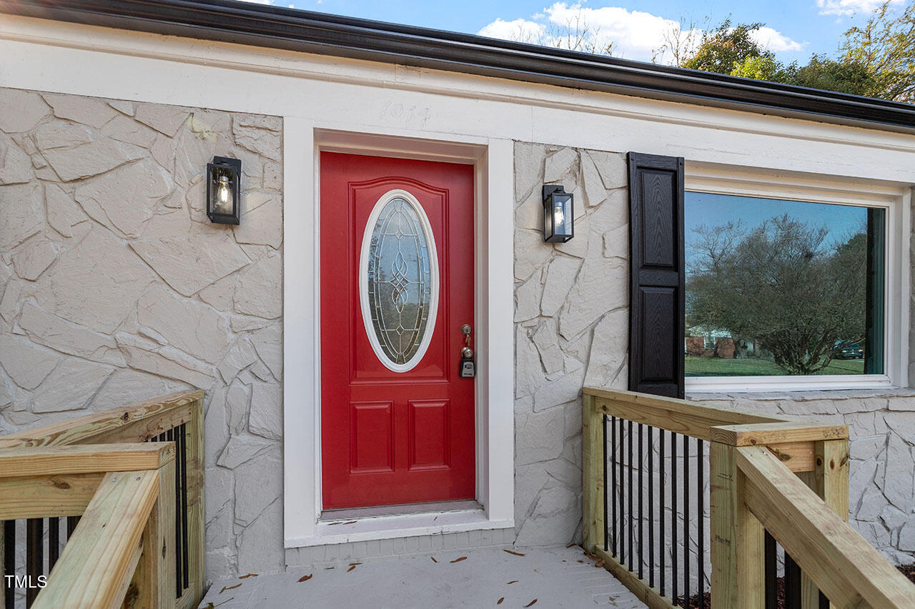 1014 Southerlund Road Garner, NC 27529 - Photo 30 of 36 a view of a door with a bathroom
