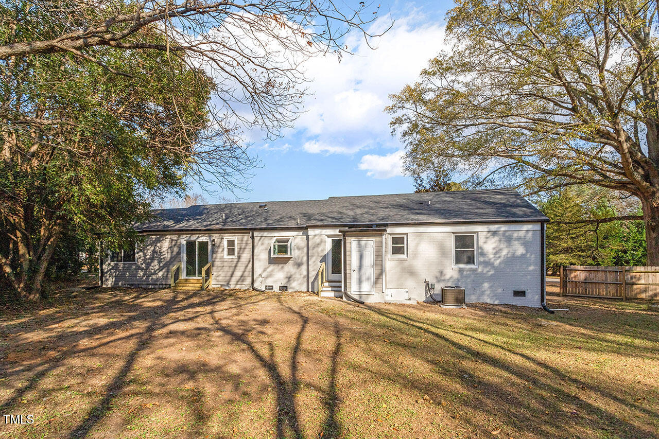 1014 Southerlund Road Garner, NC 27529 - Photo 33 of 36 a front view of a house with a yard