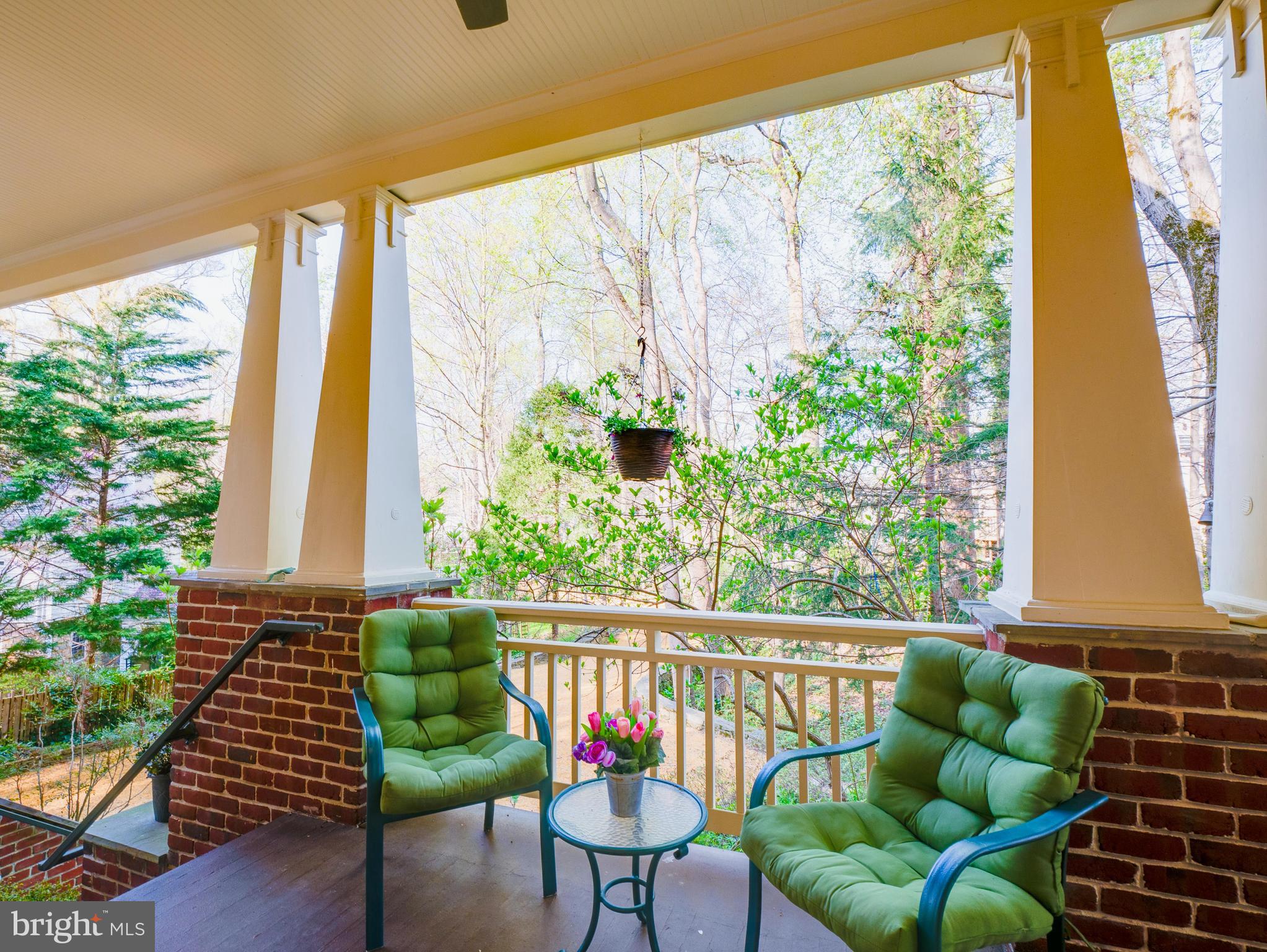 6306 Valley Road Bethesda, MD 20817 - Photo 12 of 74 a balcony with furniture and a large window