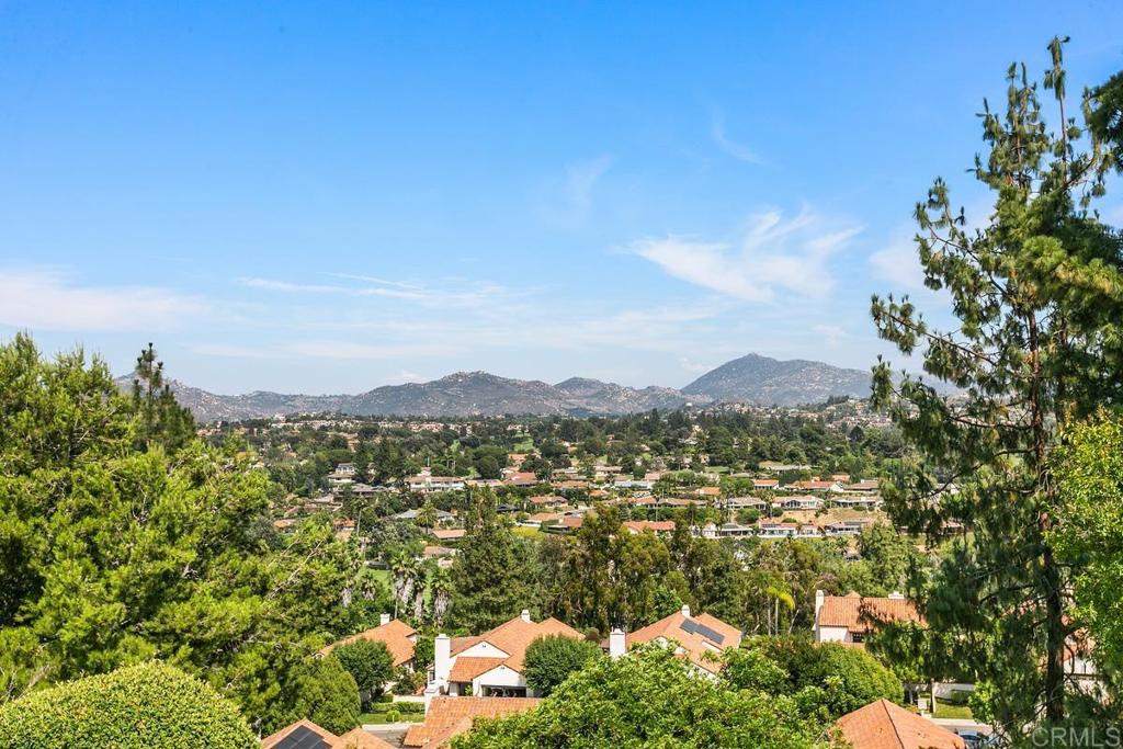 12049 Tretagnier Circle San Diego, CA 92128 - Photo 1 of 1 a view of lake with mountain