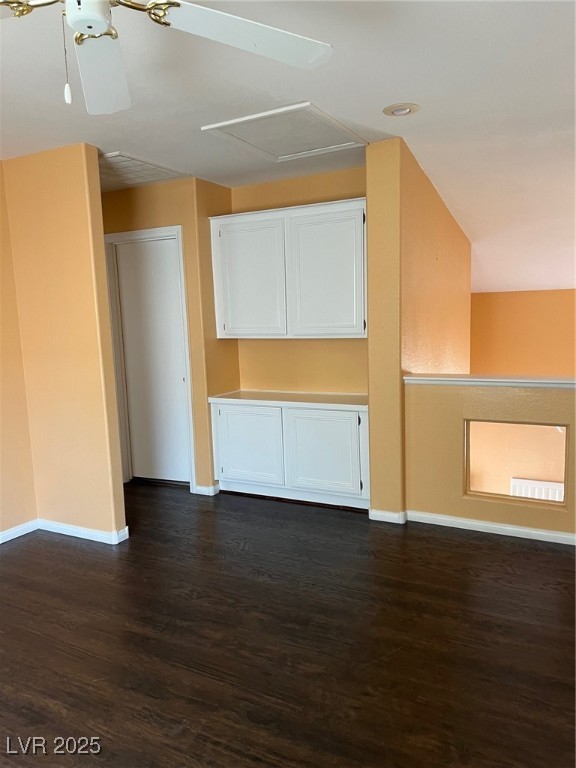 212 Silver Castle Street Las Vegas, NV 89144 - Photo 14 of 24 Empty room featuring baseboards and dark wood-style flooring