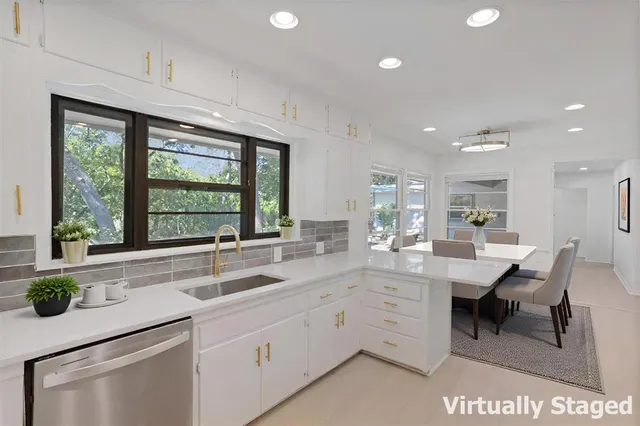 a view of backyard with a table and chair