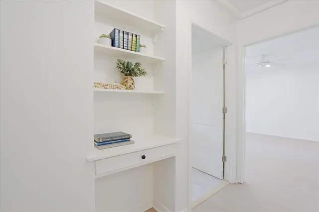 a large kitchen with kitchen island a sink stainless steel appliances and cabinets