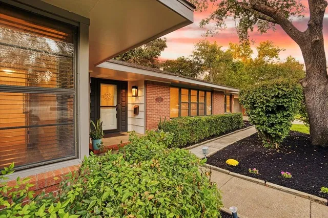 a view of a garden from a balcony
