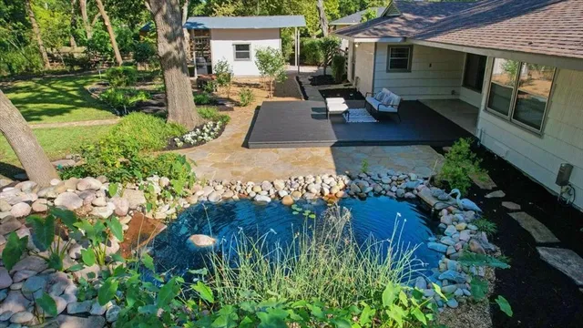 a backyard of a house with seating space