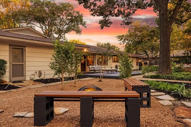 a view of house with patio outdoor seating
