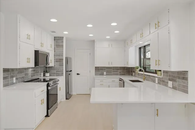 a view of outdoor sitting area with chairs