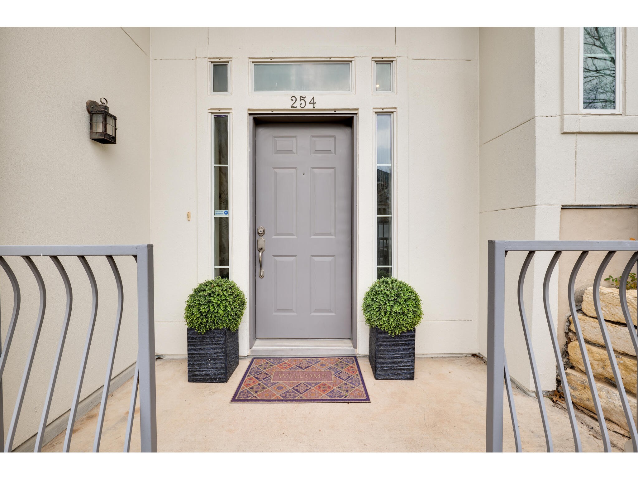 2918 Ranch Road 620 North, Unit U254 Austin, TX 78734 - Photo 2 of 35 The entrance has a covered front patio area with room to put chairs in the covered area.