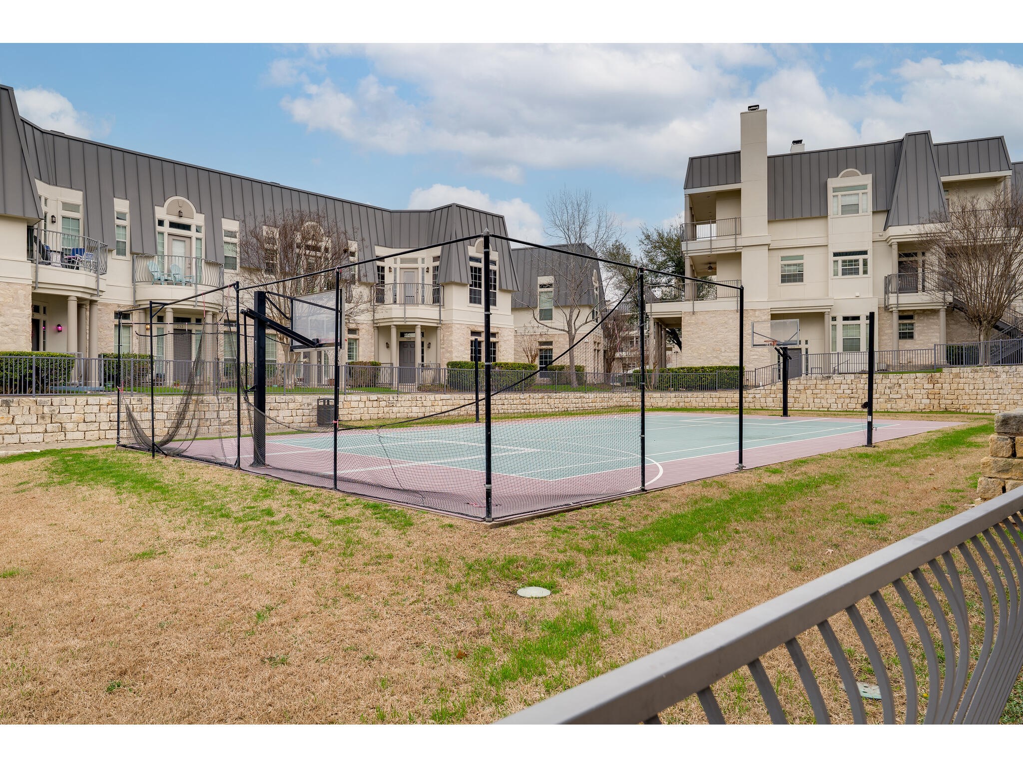 2918 Ranch Road 620 North, Unit U254 Austin, TX 78734 - Photo 21 of 35 Sport court location just outside of the unit with yard access for pets to enjoy.