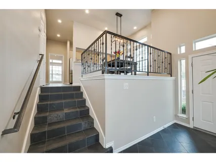 a view of entryway with a front door